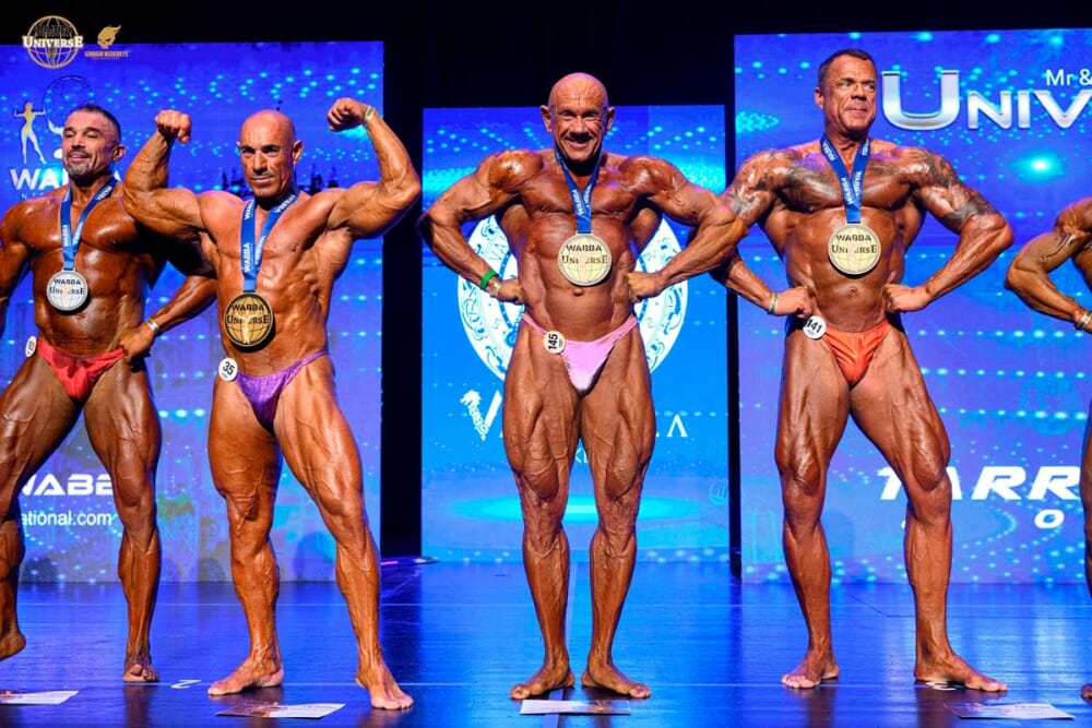 Marco Lucacci sul palco WABBA di Tarragona con la medaglia del quarto titolo